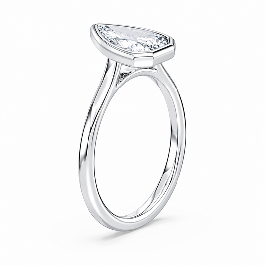 14K Bezel Set Pear Solitaire Size 7.
