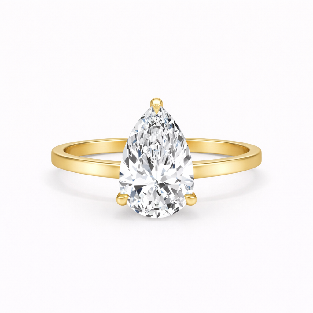 Pear Solitaire Rings