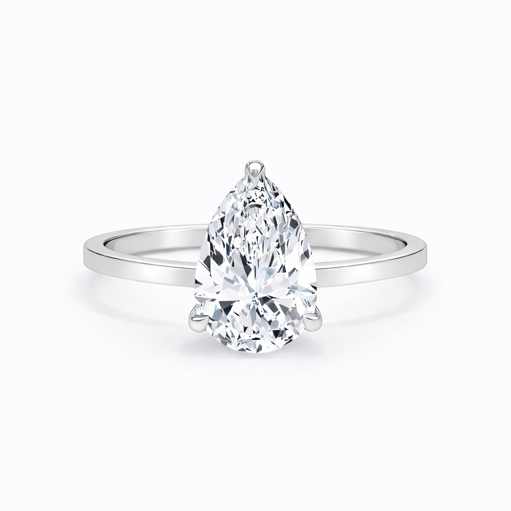 14K Pear Solitaire Flat Edge Size 6.5 — Flat Edge, Size 6.5 — 14K gold mounting